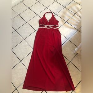 Long red prom dress with silver glitter middle, and halter neck top